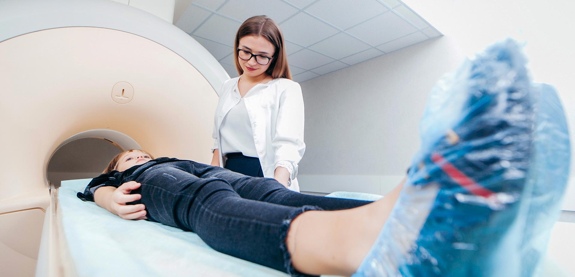 Girl going into MRI machine